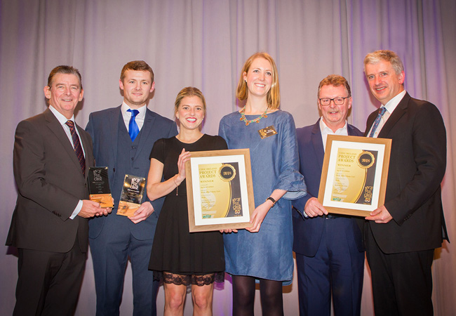 CIBSE Ireland From left: Kevin Kelly, CIBSE vice-president; Colin Moynihan, of Airflow Services; Jen Kennedy, of Arup; Mona Holtkötter, CIBSE Ireland vice-chair; Derek Elton, of Wilo; and John Burgess, of Arup, collecting the Up to €2m Project award